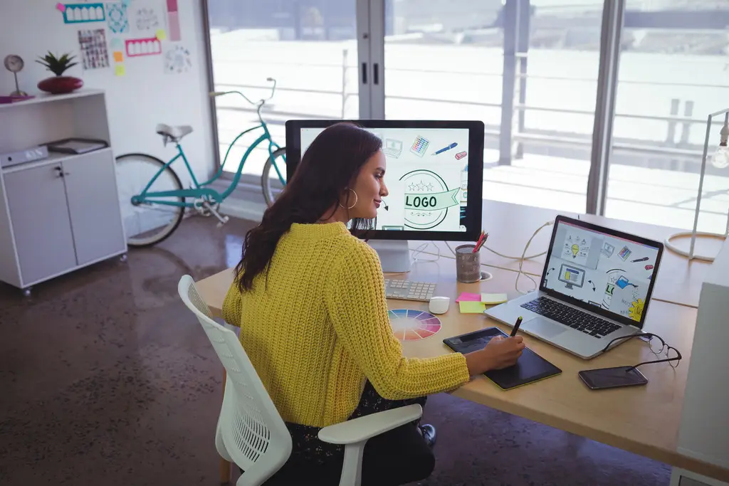 female-photo-editor-working-in-creative-office